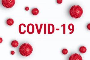 Covid-19 logo with germs around it